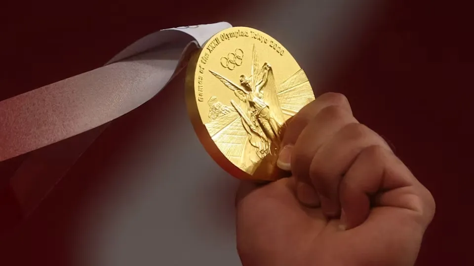 Olympic Gold medal close-up.webp