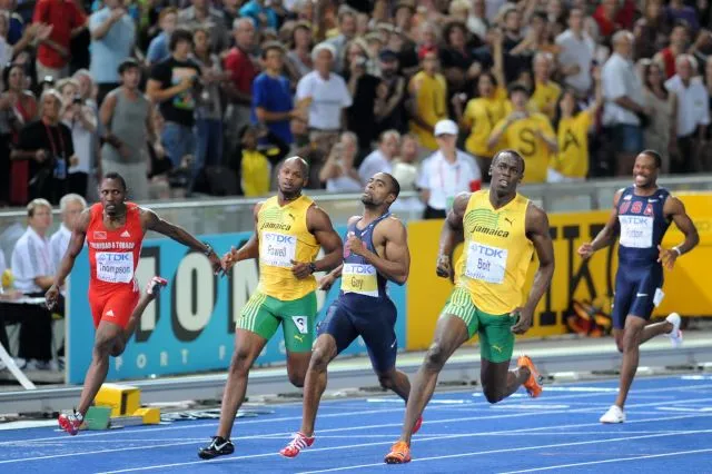 Usain Bolt running 100m sprint in Olympic.webp