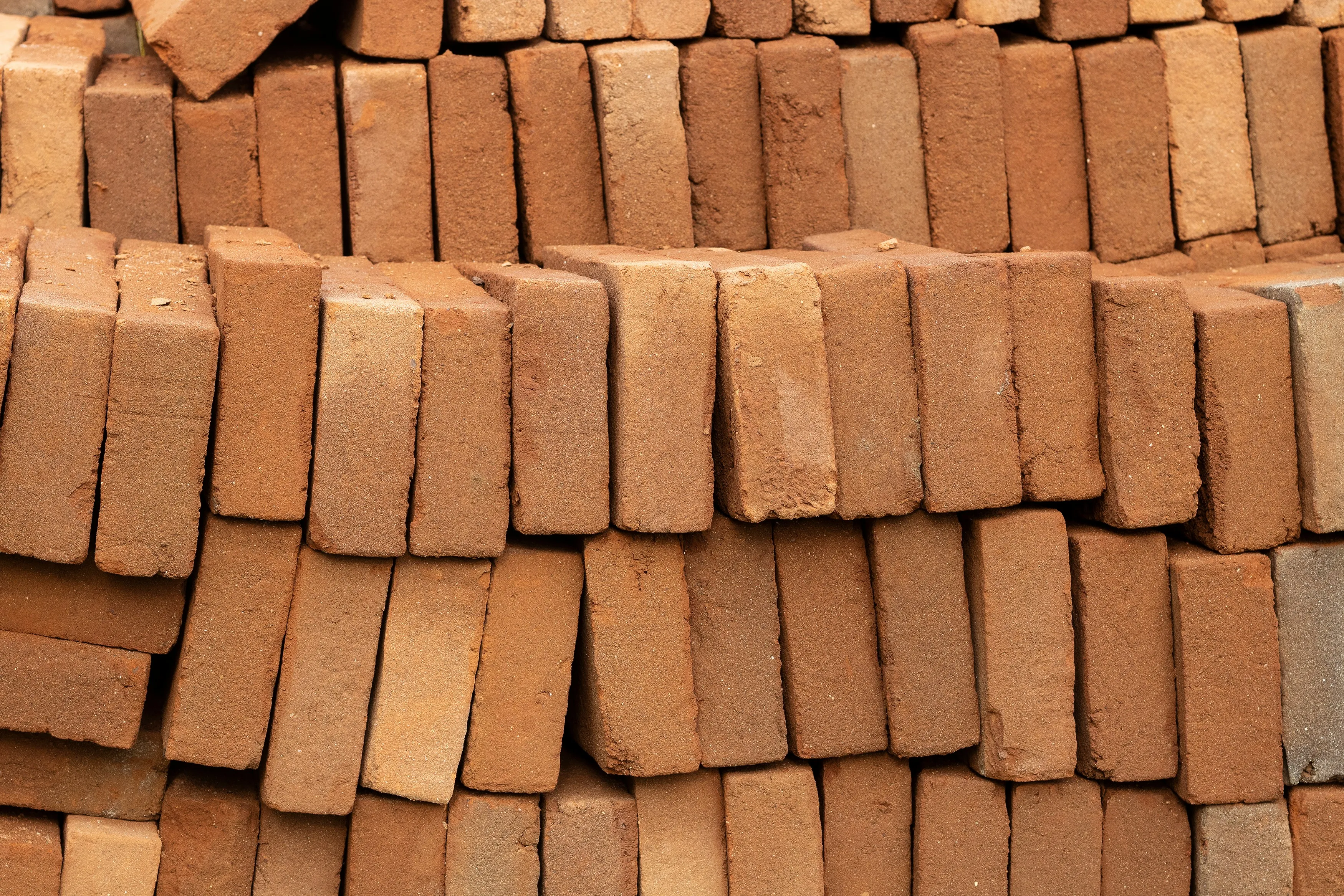 A pile of brown colored bricks